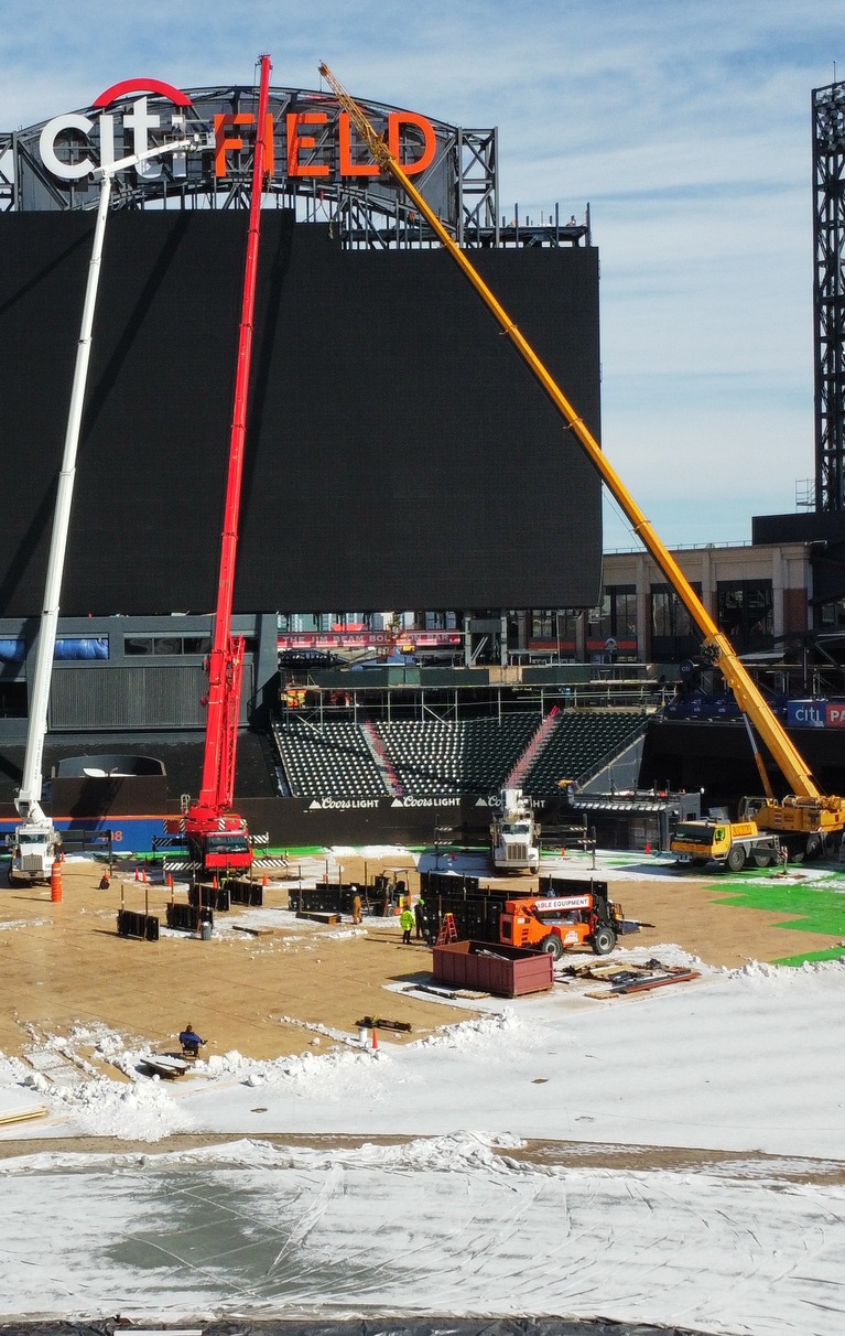 How to Squeeze 250-Ft Boom Lift into a Ballpark to Hang a Sign Above the Tallest Scoreboard