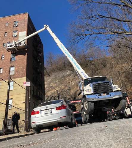 Can a boom lift be used on a slope?