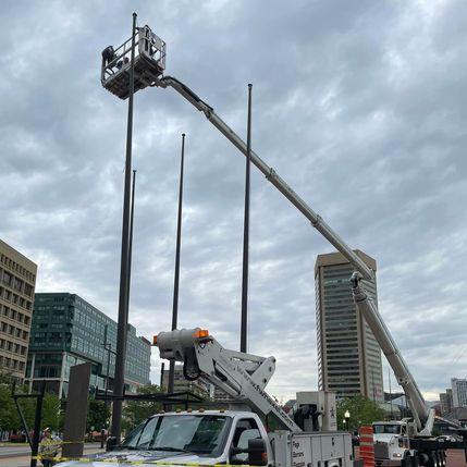 Flag Services with Alpha Platforms Boom Lift A-250 Solution